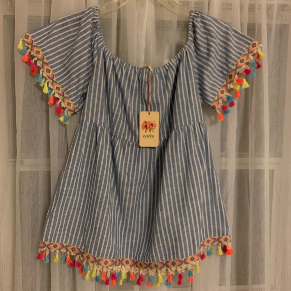 Woman’s boutique off shoulders top. Beautiful!